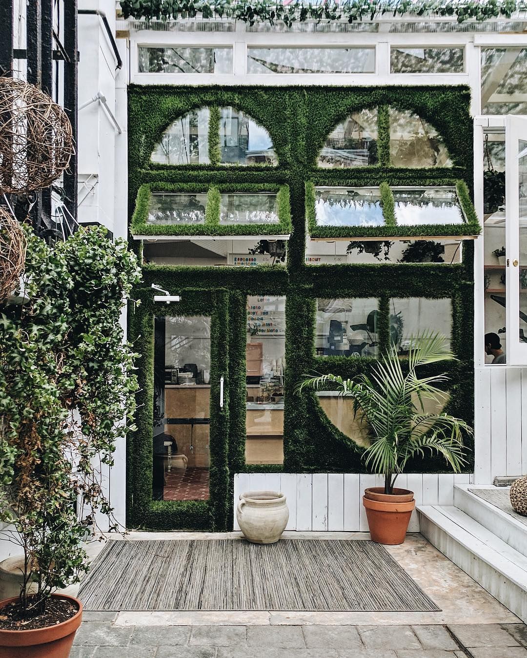 You Have to See This Greenery Covered Glass Café in Brooklyn