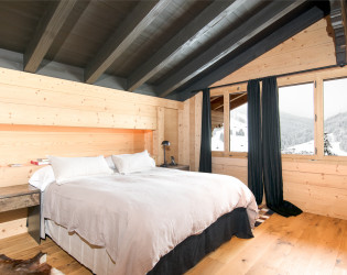 11-Switzerland-Gstaad-Hillside-Guest-Bedroom Hillside House