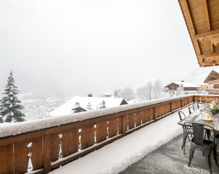 19-Switzerland-Gstaad-Hillside-Snow-View Hillside House