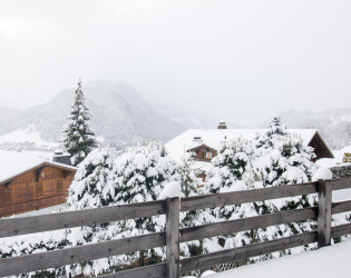 3-Switzerland-Gstaad-Hillside-Terrace-View Hillside House