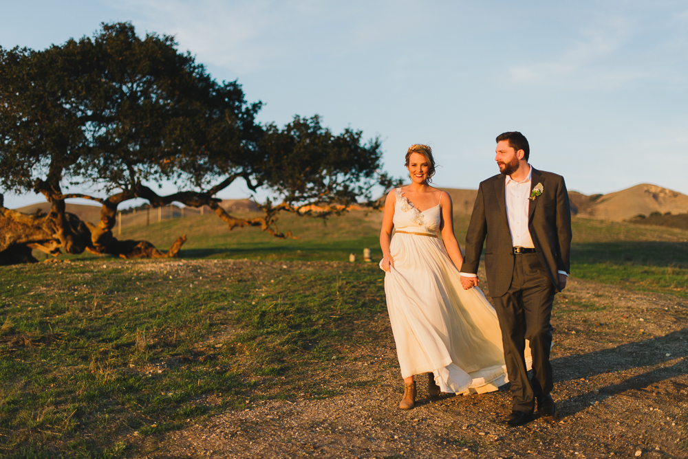 The bride perfectly pairs her wedding gown with country-chic boots.