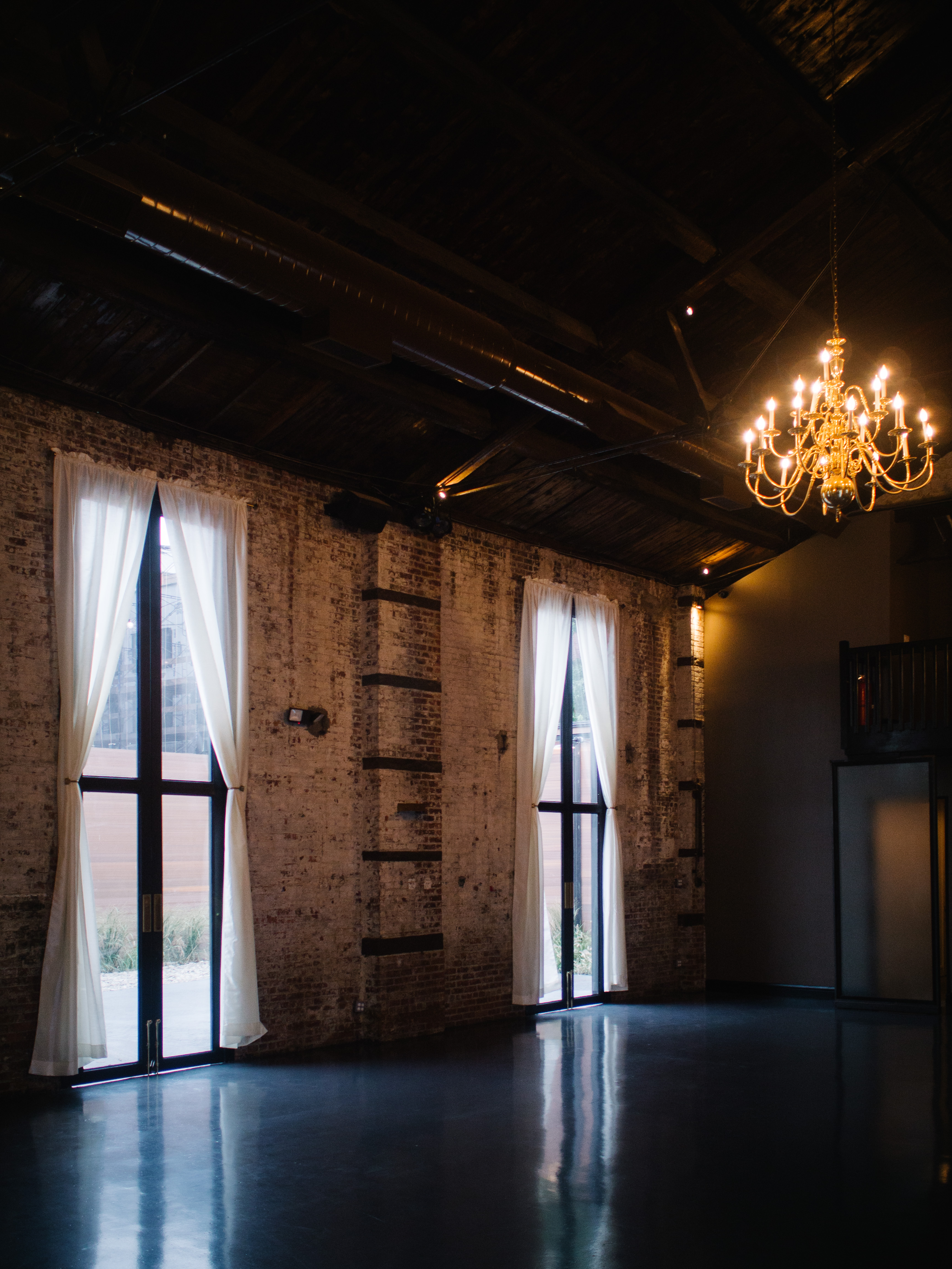 View of the main room looking out to courtyard