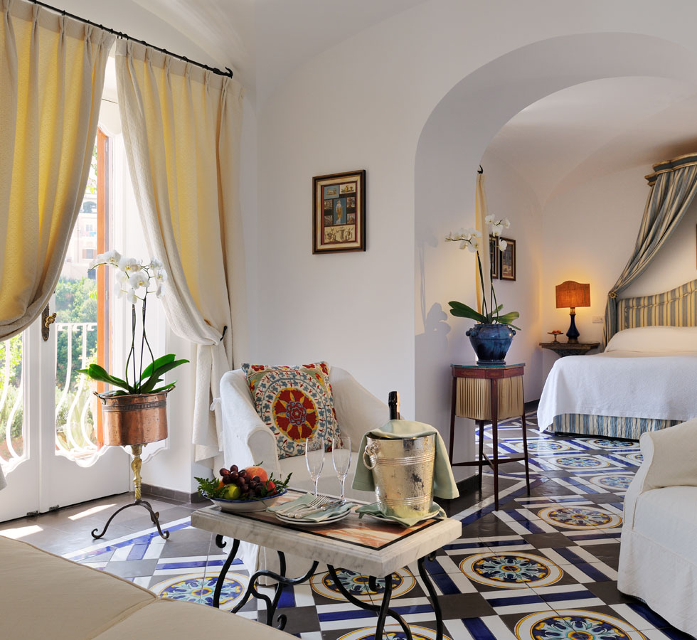 Rooms are designed with white-washed walls, vaulted ceilings and hand-made tiles on the floors.