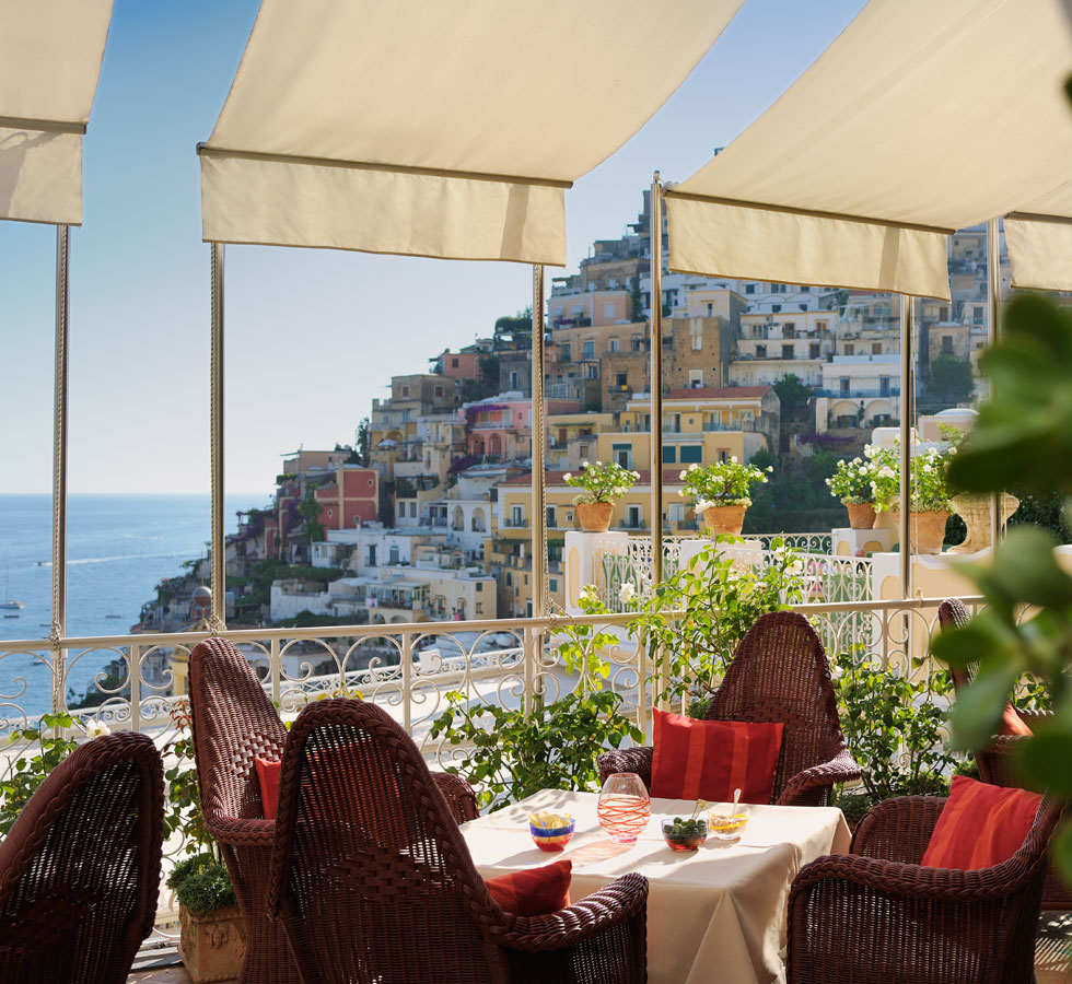 Terrace filled with roses and frangipane flowers.
