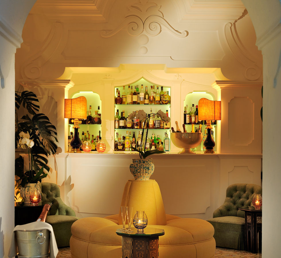 Indulge in a drink indoors while admiring the sophisticated and elegant details of design.