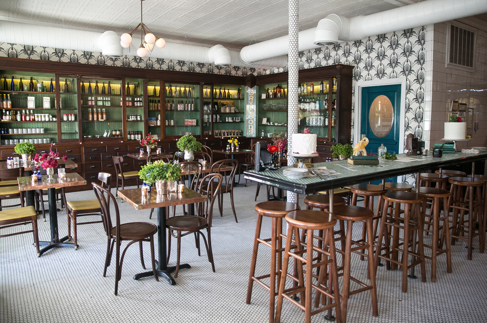 A restaurant & specialty grocery store venue located in the old Hillside Drugstore building beautifully restored using original pharmacy cabinetry