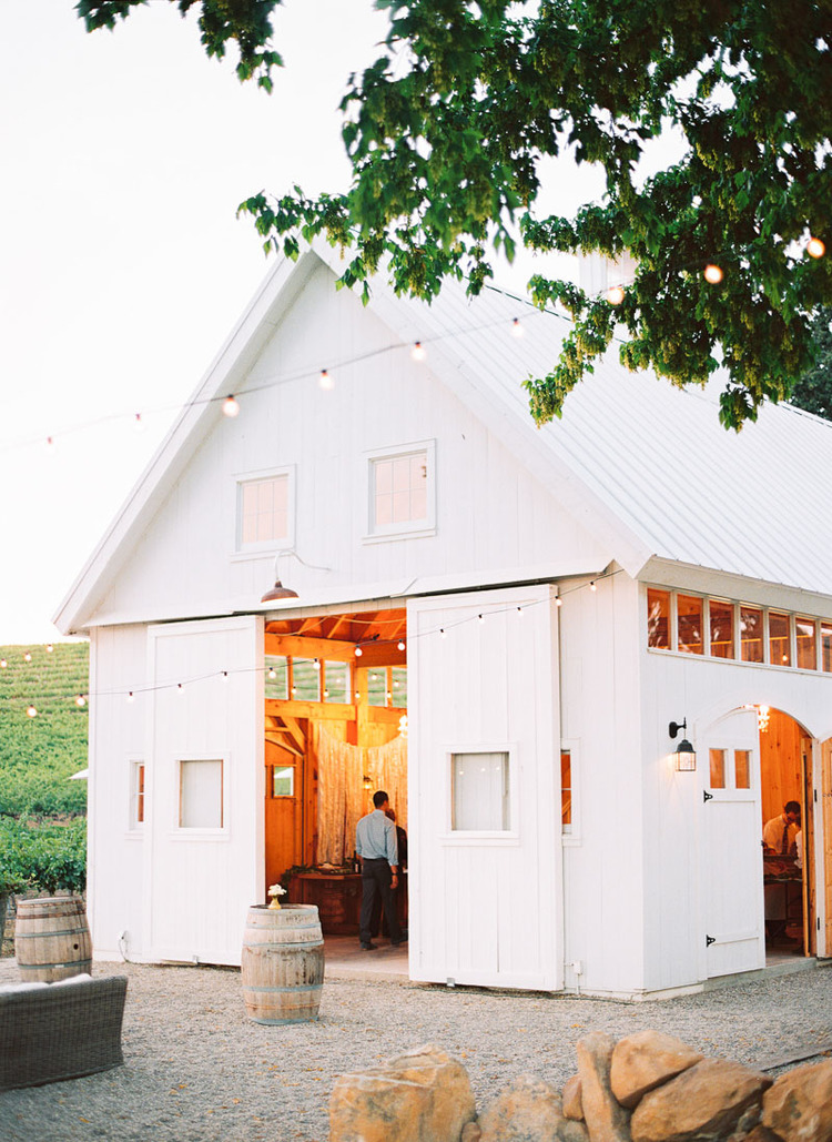 For smaller parties host in the custom New Hampshire style barn with 2 story vaulted beamed interior, ambient lighting and views of the vineyards.