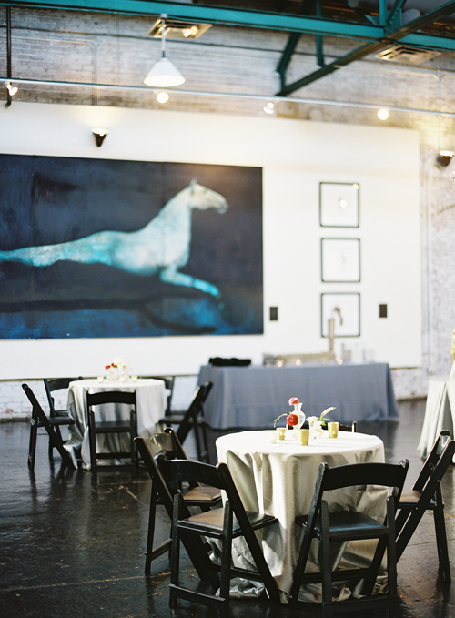 King Plow is an industrial event venue in Atlanta, Georgia. Vivid paintings mingle gracefully with artifacts that recall the building’s industrial past.