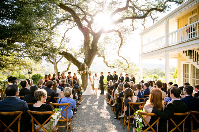 Sitting in a Tree Events designed this floral laden ceremony site