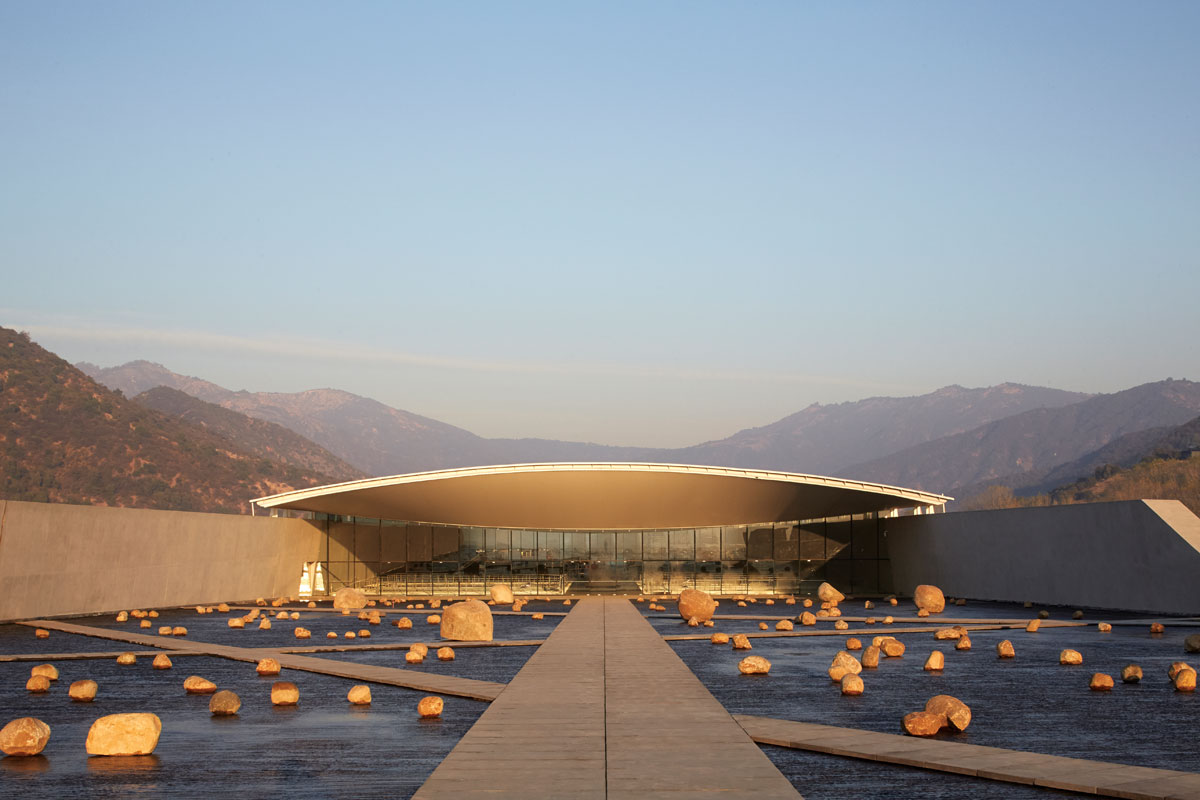 Viña Vik is comprised of 22 luxurious suites in a glass and golden titanium sculptural building situated on a hilltop boasting breathtaking 360-degree views of the 11.000 acre VIK Vineyard and surrounding nature.