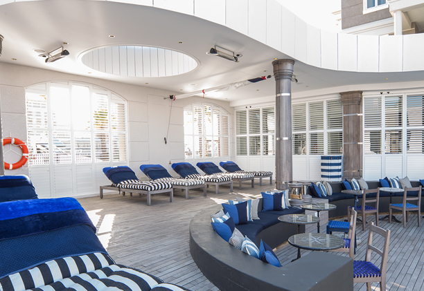 Lounge with your friends on the pool deck.