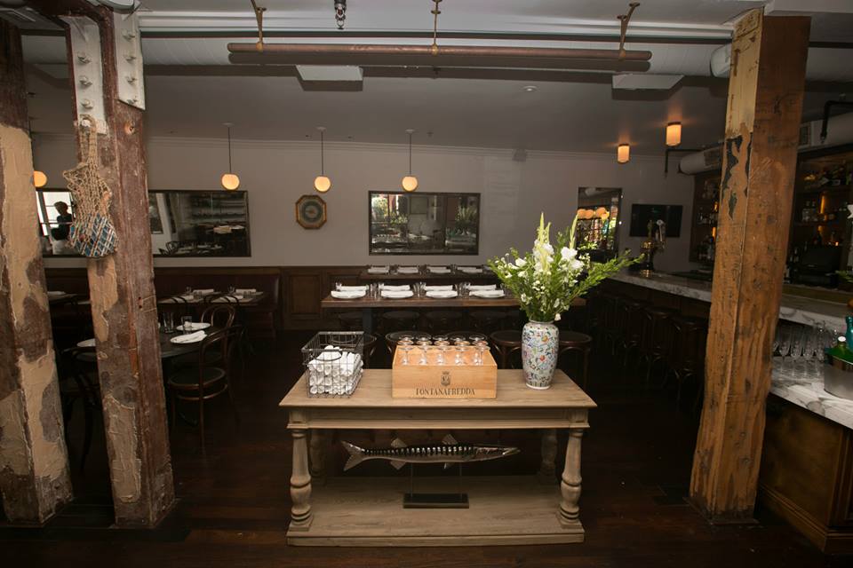 The 3,400 square foot restaurant draws design inspiration from the existing natural elements in the building.
