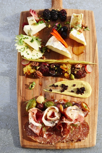 The inventive menu is comprised of vasi, antipasti, boards, insalate, pizza, pasta, piatti and dolce.
