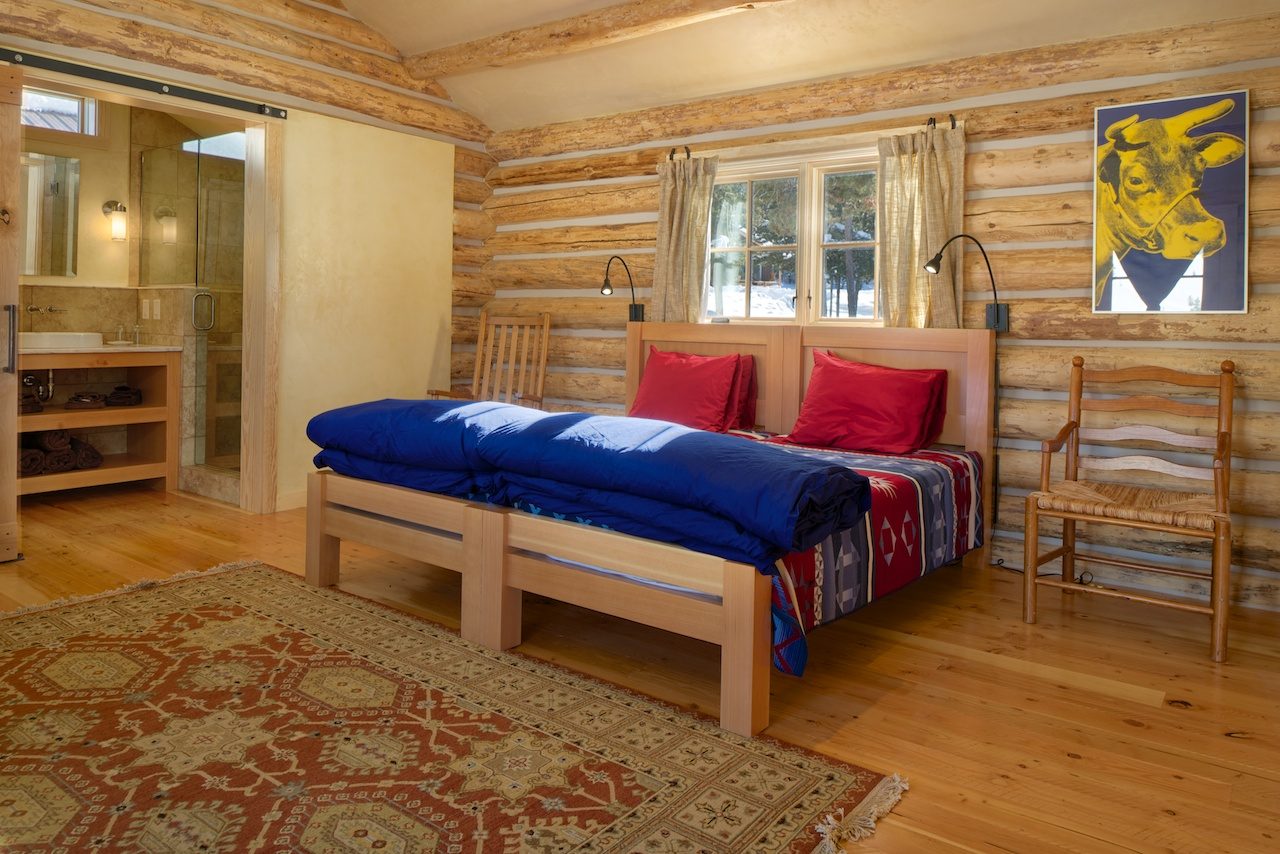 The cabin's spacious porch comes complete with rocking chairs and amazing views of the Grand Teton wilderness just beyond.