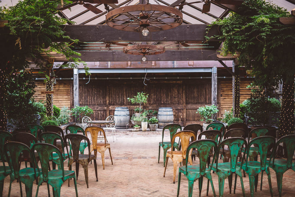 Ceremony with industrial vintage chairs.