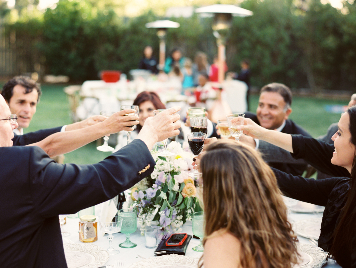Cheers to a beautiful outdoor wedding.