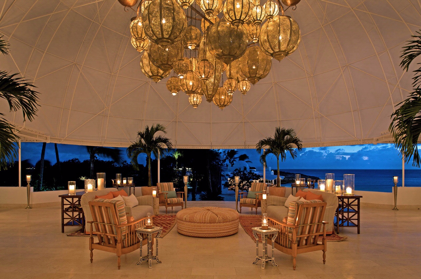 The Lobby at dusk with beautiful light fixtures.