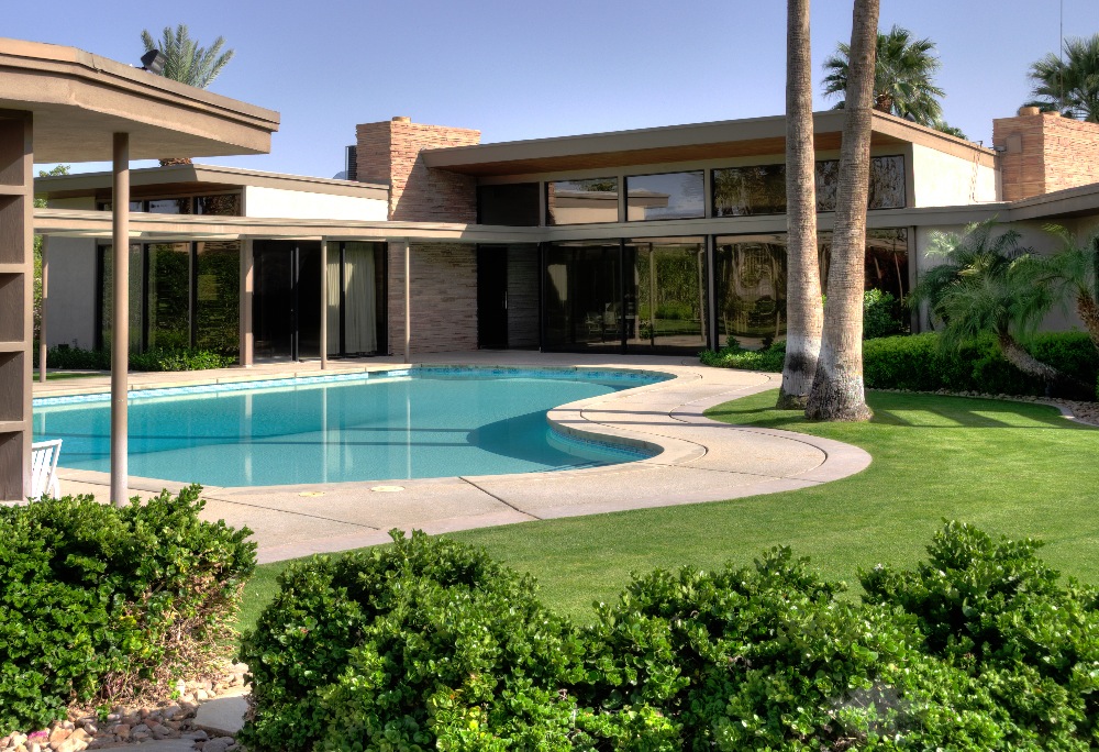 This Palm Springs architectural gem features exquisite period furnishings and infamous piano-shaped swimming pool.