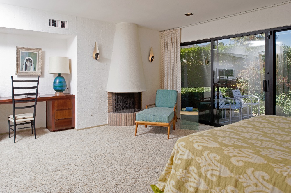 The residence includes a master suite, guest suite, guest bedroom, and an exterior entrance guest room.