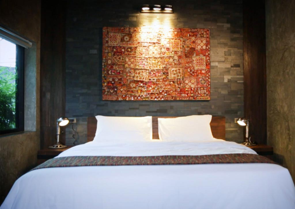 Its six individual suites (including one dedicated to children or personal assistants) are set around a spacious swimming pool in a lush tropical garden.