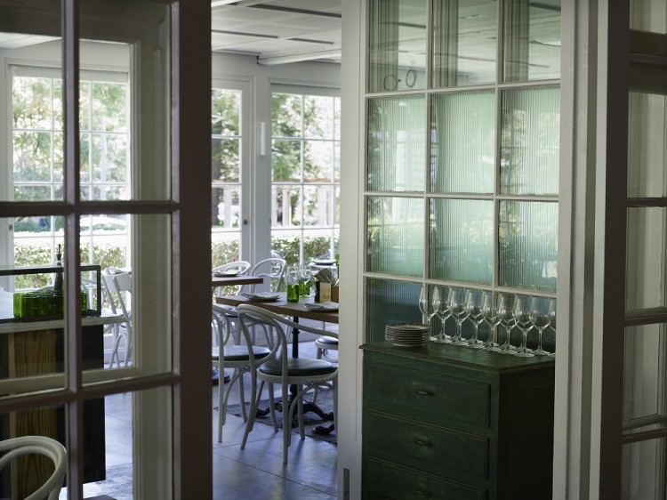 The semi-private area located at the garden end of the restaurant with gorgeous views over our kitchen garden is separated from the main restaurant by frosted glass doors.
