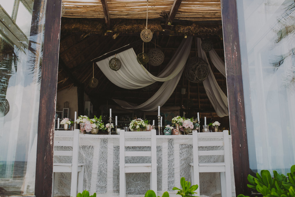 Intimate wedding reception by the beach.