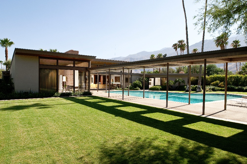 View of backyard pool and lawn, great for events.