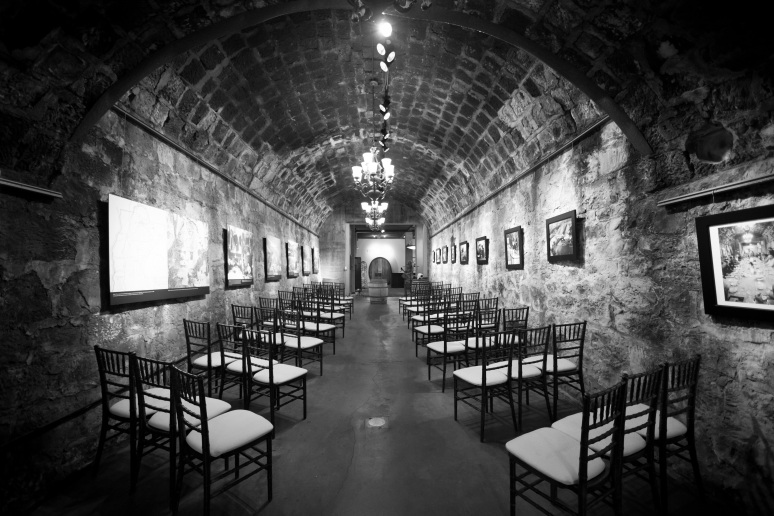 Just steps from the patio is our impressive wine cave, perfect for an enchanting indoor ceremony.