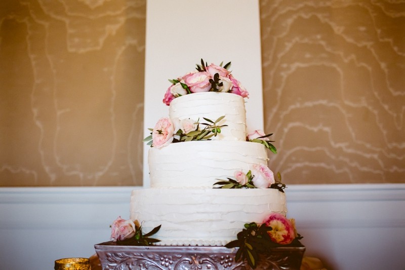 The Ballroom is 3,000 square feet, with five glass doors that lead out to a covered heated patio area and lush gardens.