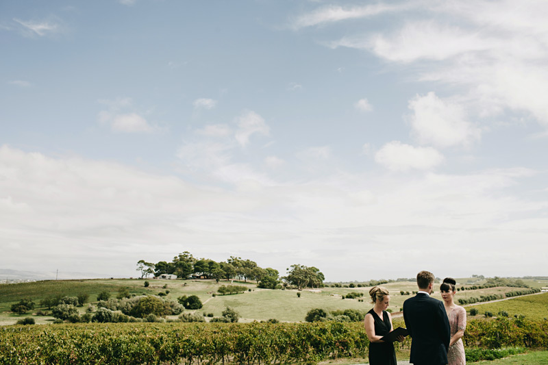 Ceremony with rolling hills view.