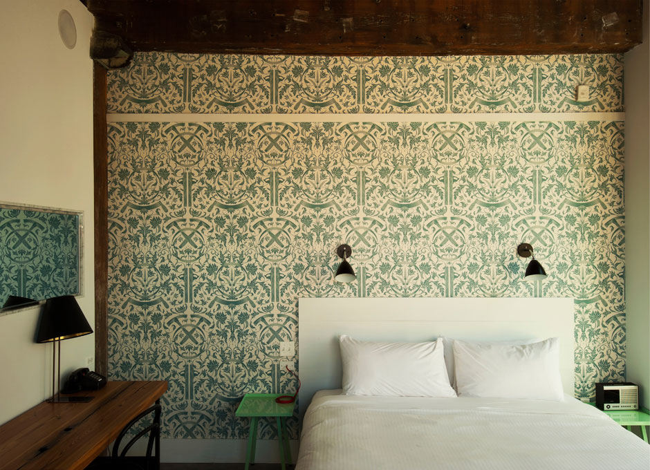 Historic Corner King Room - All of the inherent character of the building has been meticulously preserved--its heavy yellow pine beams, pine ceilings, original masonry and brick walls, arched windows and cast-iron columns are all original.