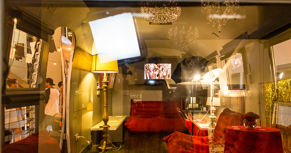 The Media Lounge, inside our remodeled vintage airstream trailer, offers a quiet seating area with a large, flat screen TV perfect for looping footage, slideshows, and movies.