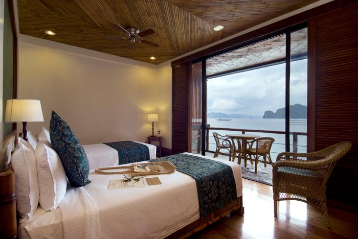 Apulit Island has 50 water cottages that combine traditional Filipino architectural style with contemporary design.
