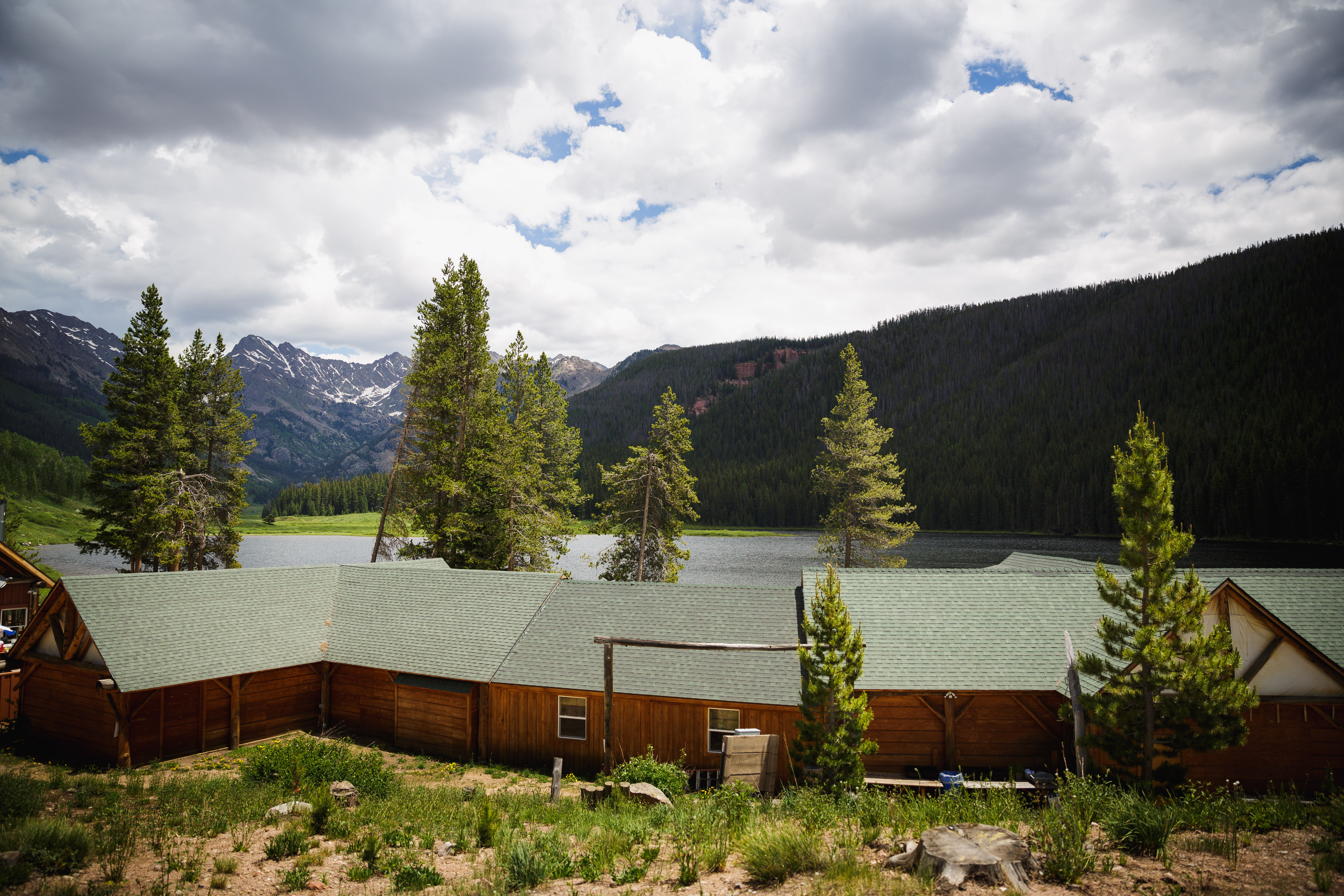 Imagine waking up and walking out the front door of your cabin or yurt to sit on your private porch, coffee in hand, to a panoramic view of some of the most beautiful Rockies you’ve ever seen.
