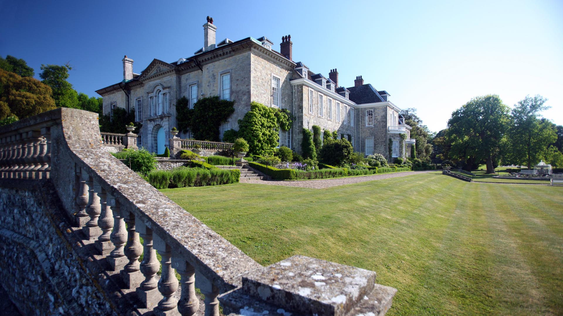 As the house stands today, the mansion is arranged around two courtyards, separated by the hall range, aligned approximately east-west with the long axis of the hall range situated north-south, under the lee of the Downs.
