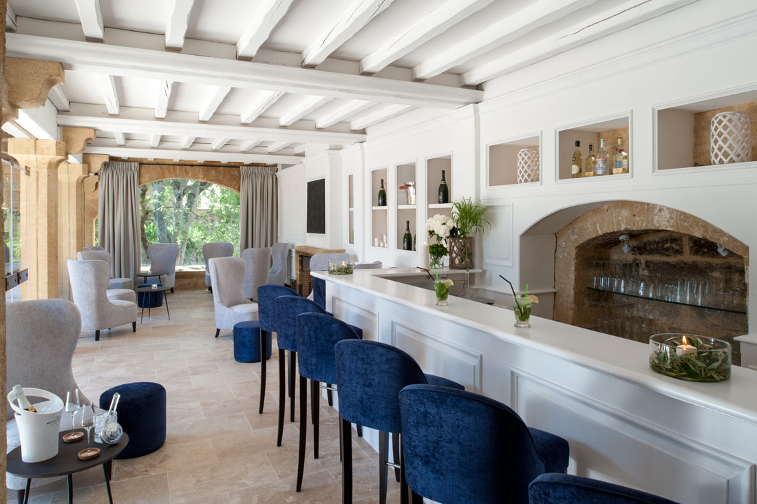 Grab a drink by the bar.