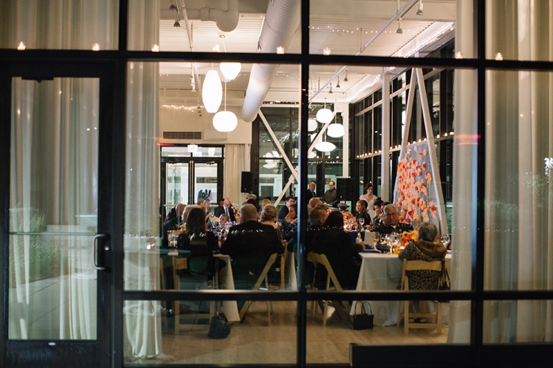 The loft features beautiful lighting design - hanging lamps designed by George Nelson suspended from the ceiling, Edison Bulb pendants above the center island, and twinkle lights around the ceiling collectively make the room is festive and bright.