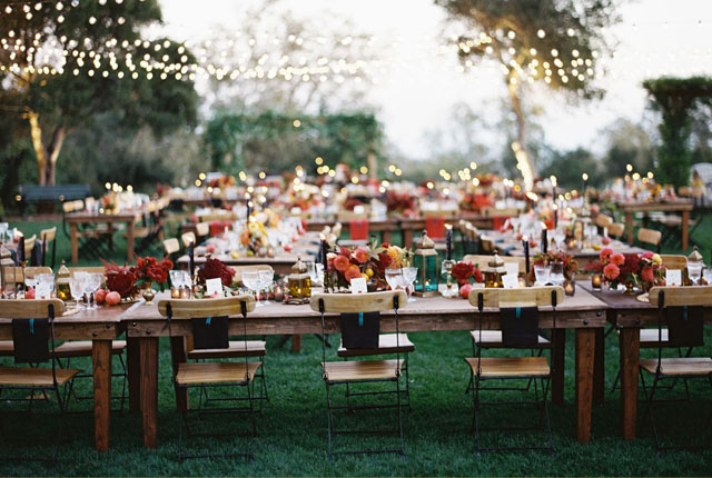 Outdoor reception with string lights.