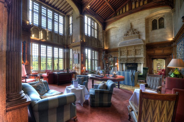 Double story lounge with large windows.