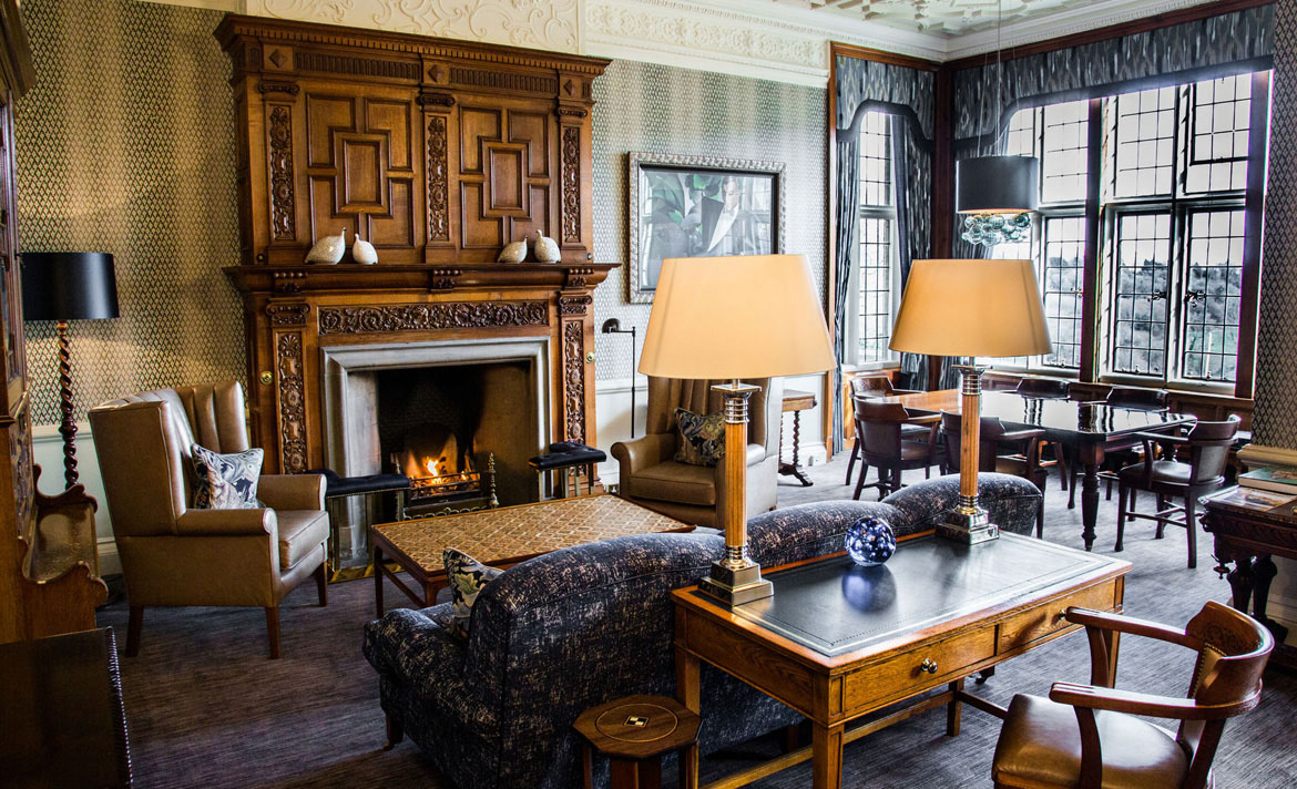 Cozy up by the fireplace.