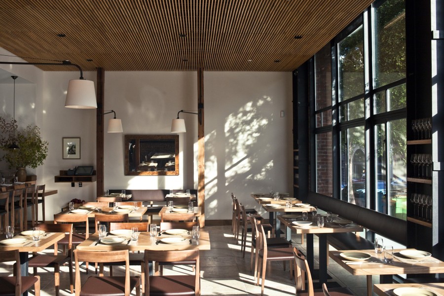 With original brick and steel bracings mixed with sleek, tailored design elements, carefully-selected by Lindsay Tusk, creating a warm, inviting ambiance.