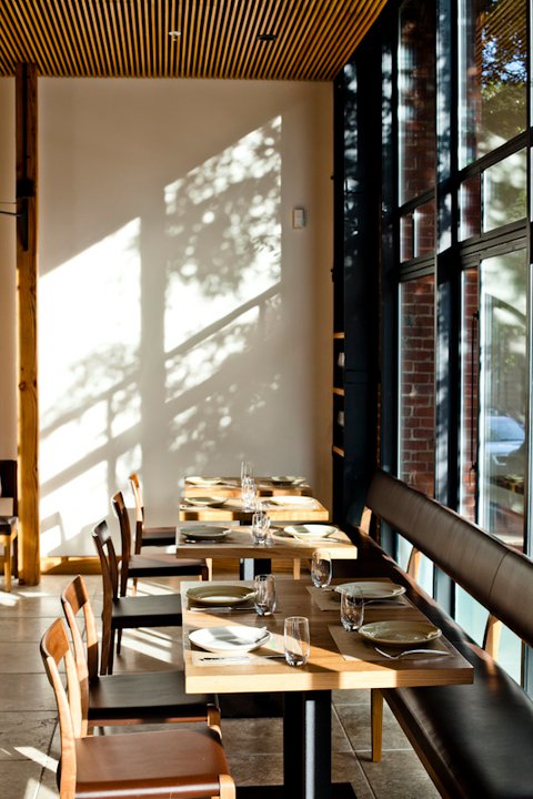 Floor-to-ceiling windows afford abundant California sunshine and dramatic views of the Transamerica Building.