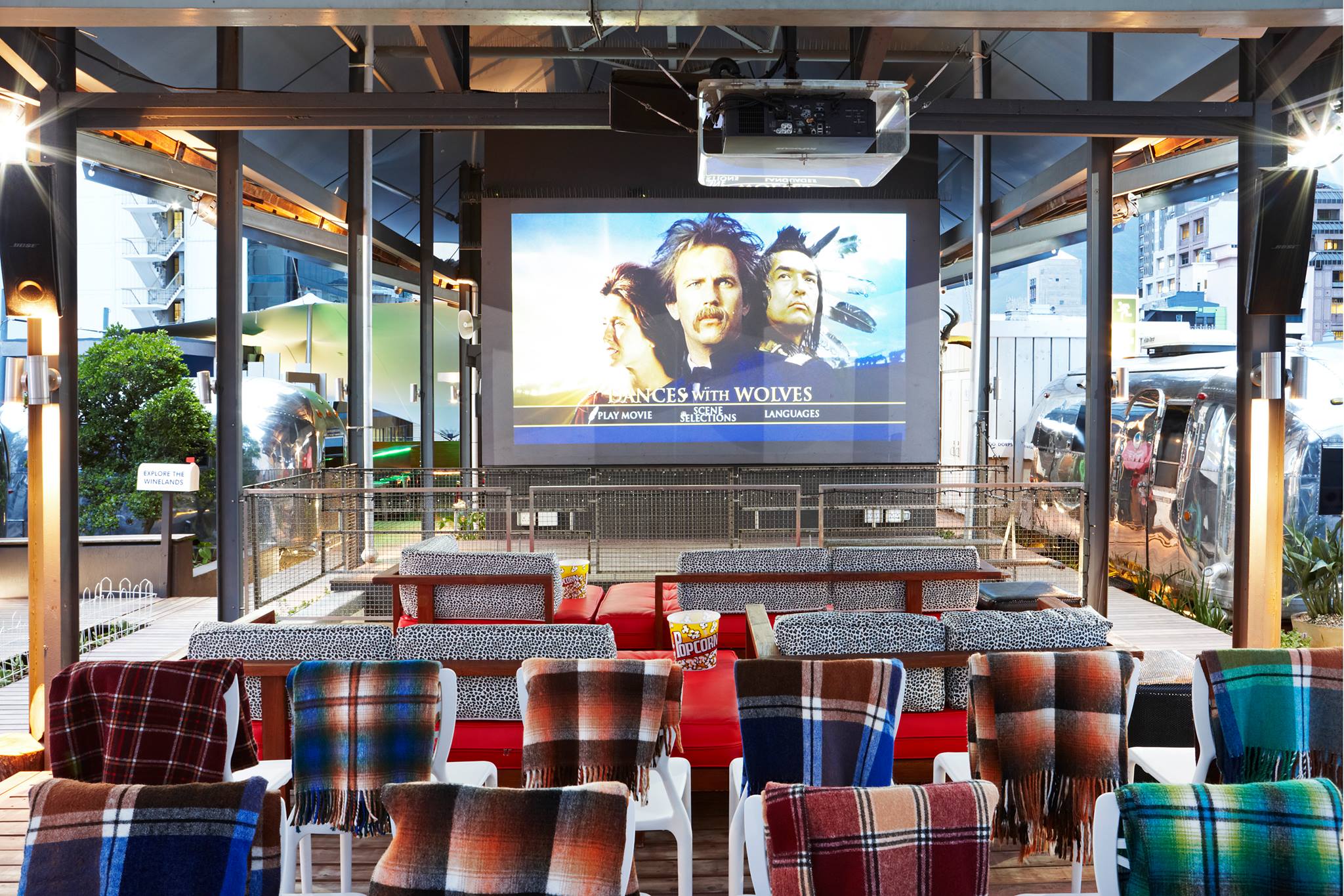 Celebrating the silver screen in a outdoor cinema setting – right beneath the African night sky, the Pink Flamingo Rooftop Cinema is set among seven vintage Airstream trailers on the rooftop of the Grand Daddy Hotel.