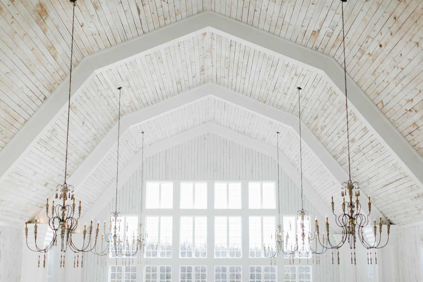 We're not lying when we say this is one of the most beautiful, whitewashed vintage barns we've seen for a wedding, ever.