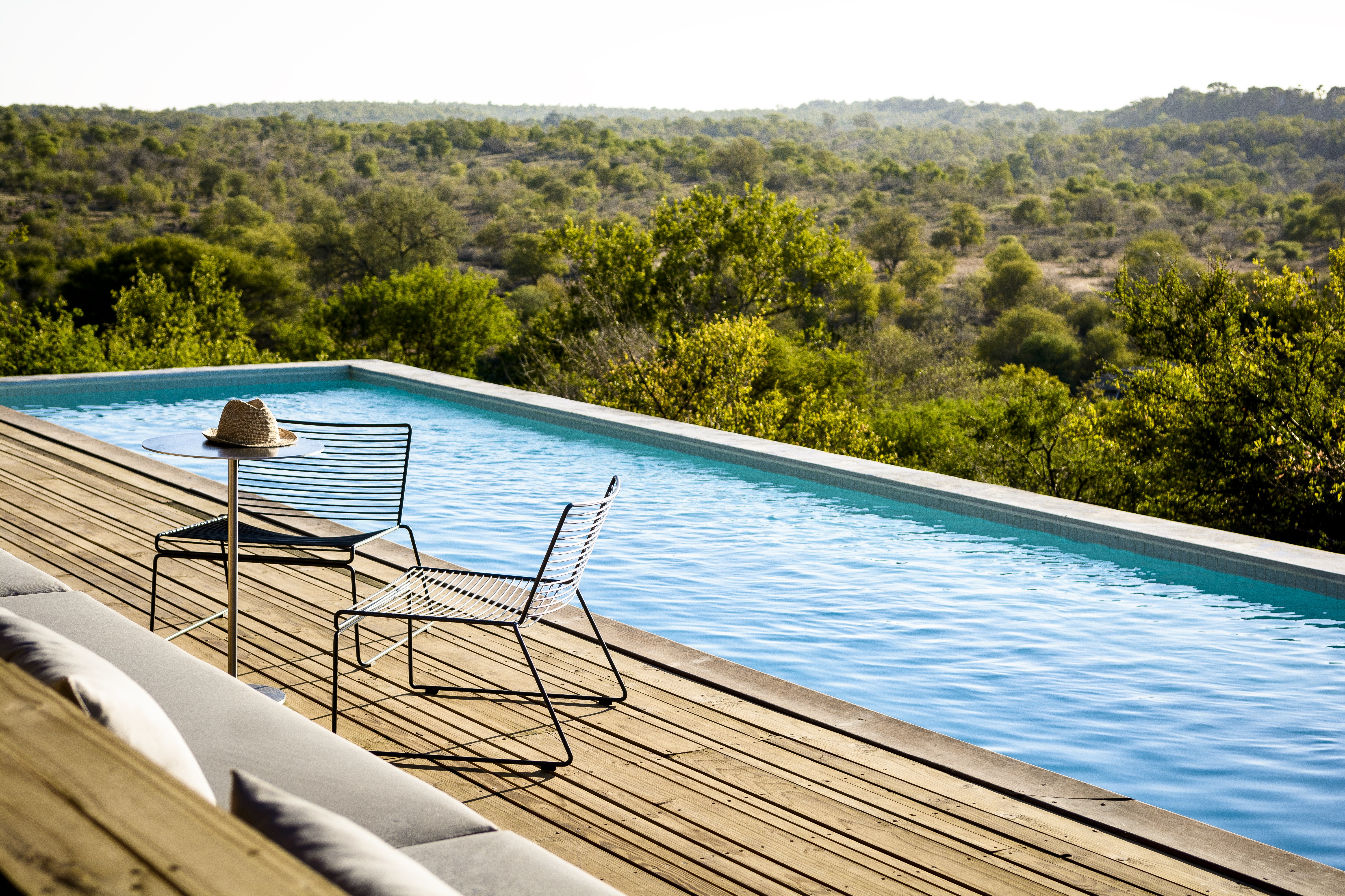 The main lodge areas at both Singita Sweni and Lebombo Lodges are home to spacious swimming pools, each providing a delightful respite in the picturesque wilderness.