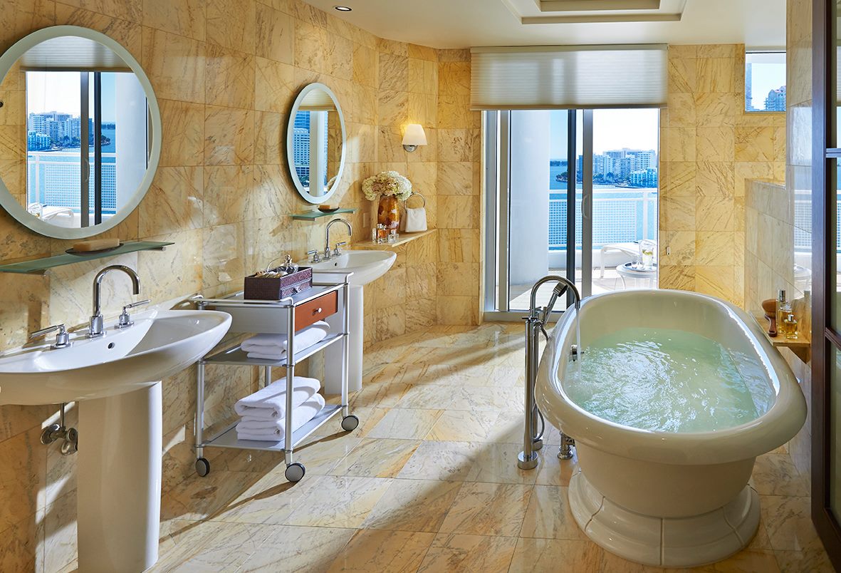 Spa like bathrooms with soak in bath tub.