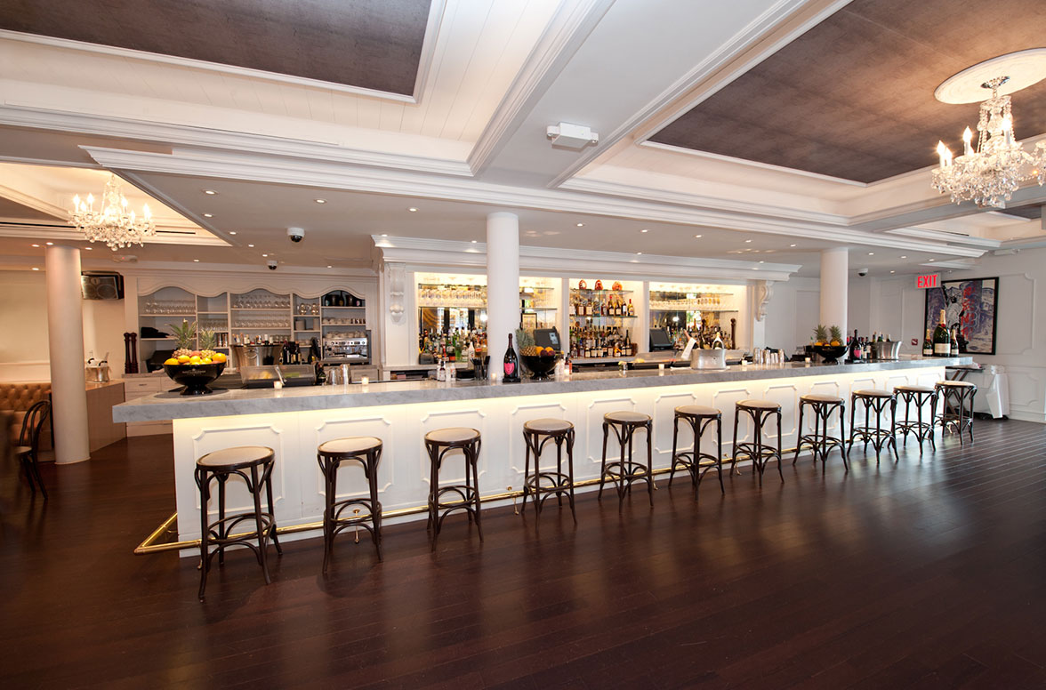 Grab a drink by the bar and enjoy a delicious meal.