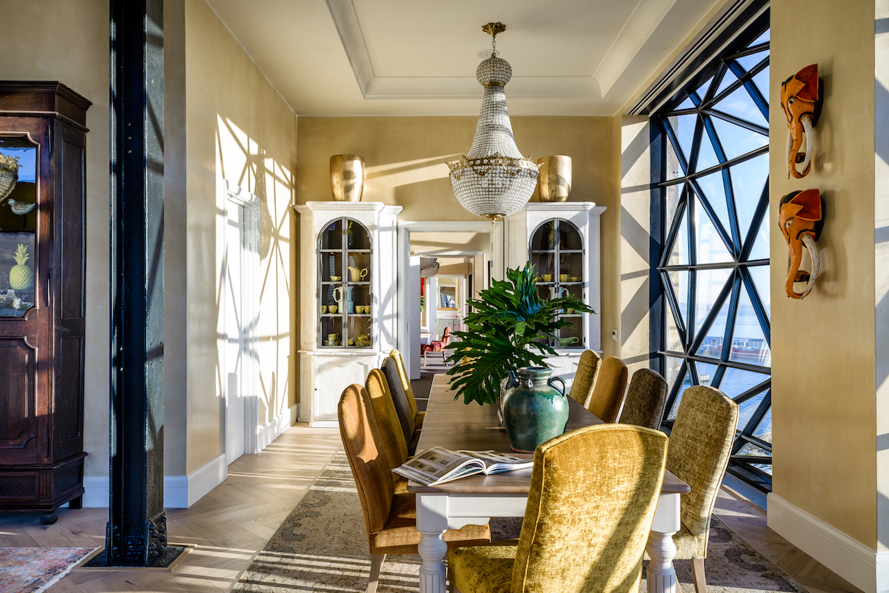 The beautiful Penthouse Dining Room table seats 10 special guests.