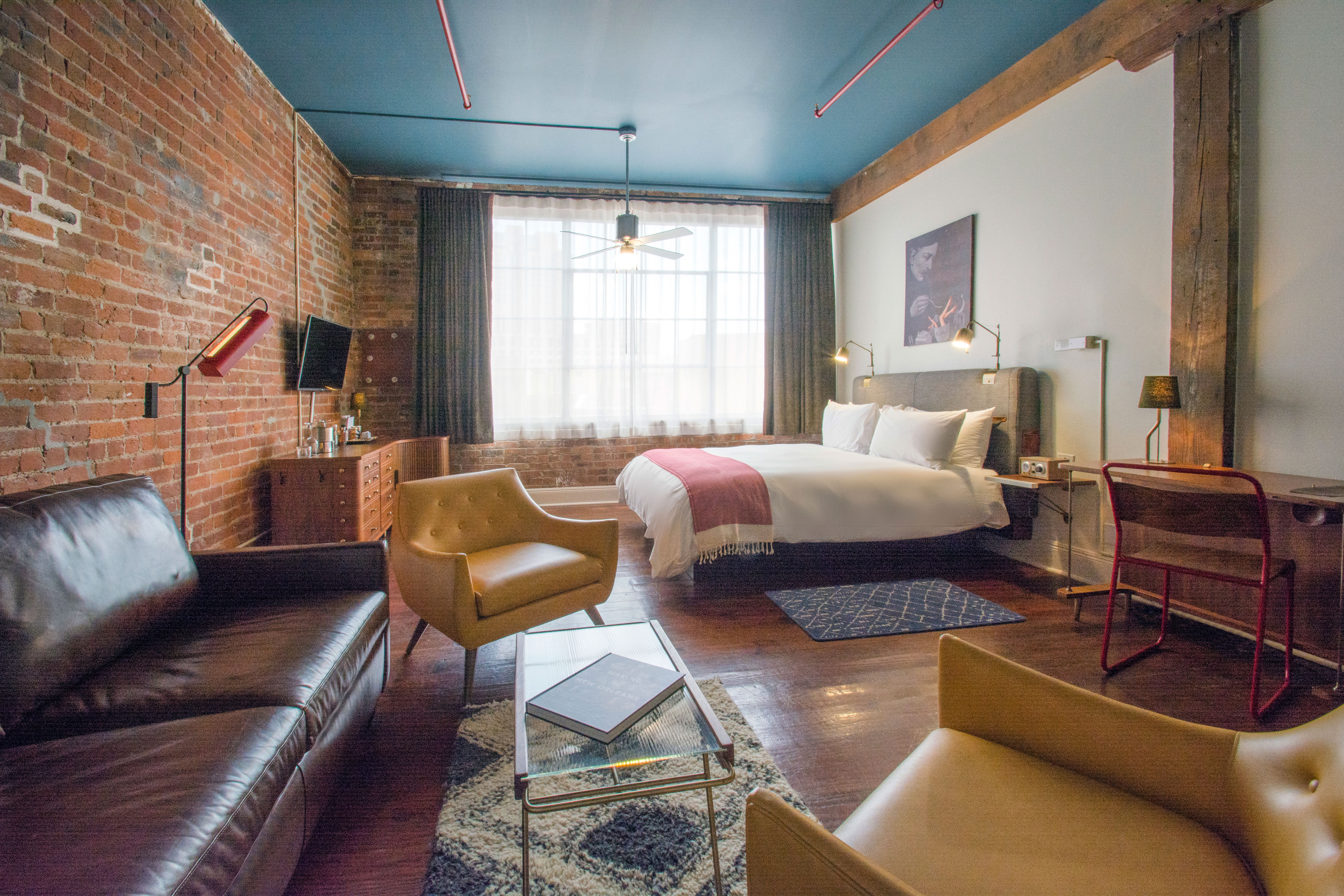 The massive King bed, hard wood floors, exposed brick, brand new walk in shower, massive windows and stylish décor will make you feel like you’re staying in an artist’s loft.