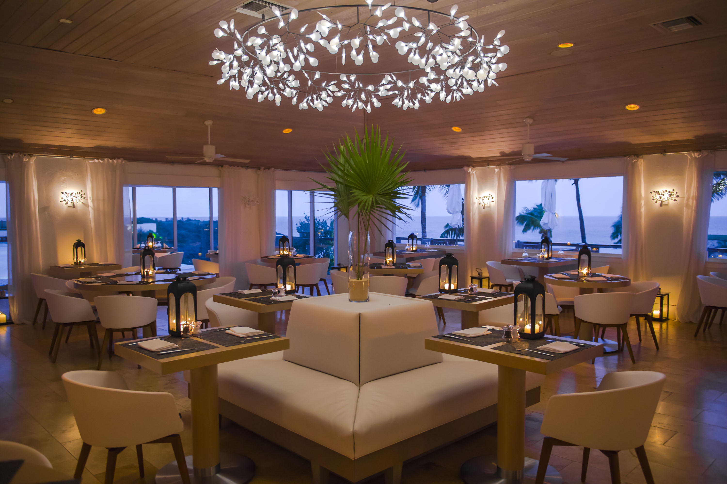 The full-service Freedom Bar features floor-to-ceiling windows with gorgeous views of Caribbean waters.